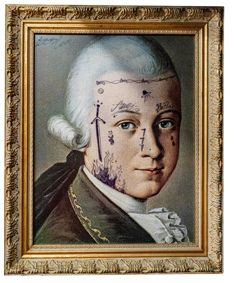 A portrait of Mozart, defaced with the Subsocial profile